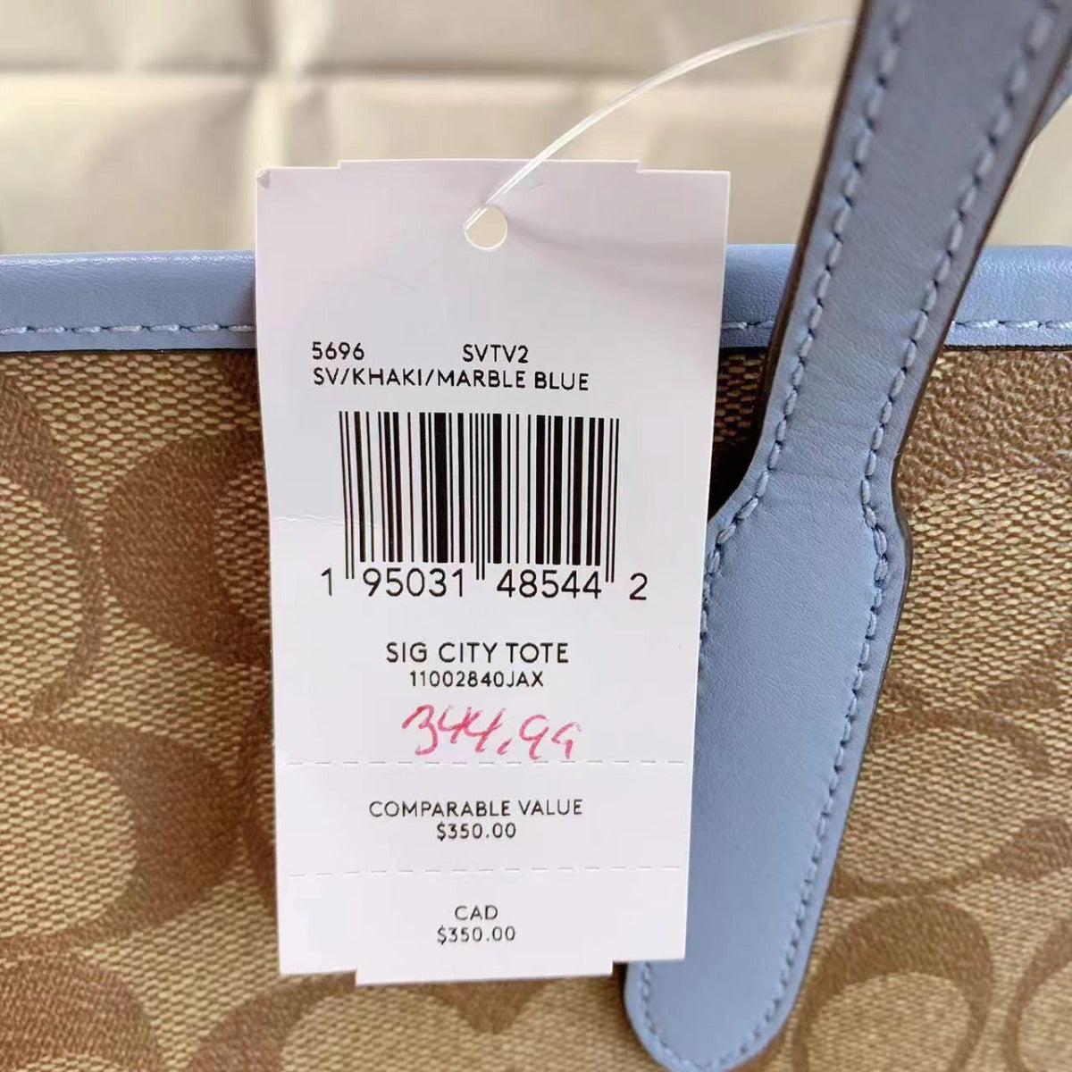 Coach 5696 City Tote In Signature Canvas In Khaki/Marble Blue Coach 5696 City Tote In Signature Canvas In Khaki/Marble Blue